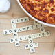 Illustration for article titled The Perfect Potholder For Crossword-Loving Chefs